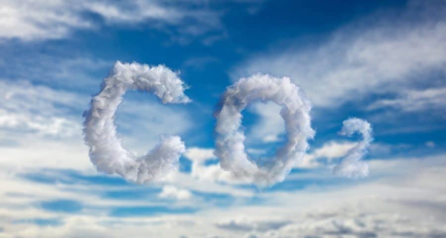 Cloud CO2 symbol on blue sky background. Planet pollution, smog concept. 3d illustration