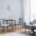Stylish scandinavian living room with design furniture.