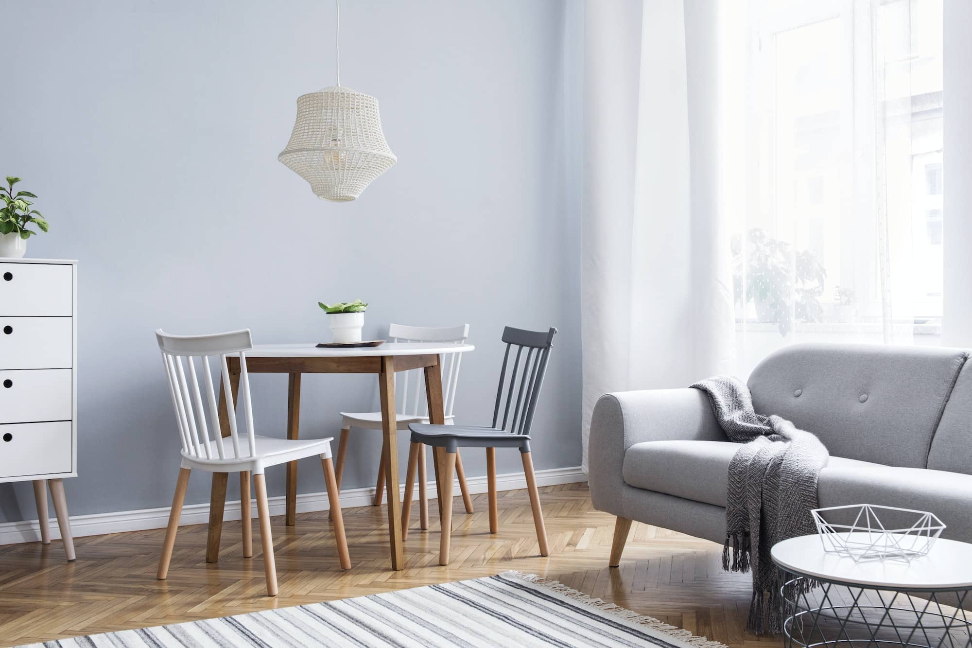 Stylish scandinavian living room with design furniture.
