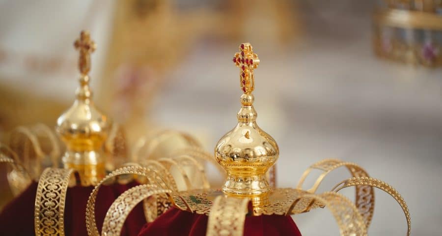 Wedding golden crowns ready for wedding ceremony in orthodox church